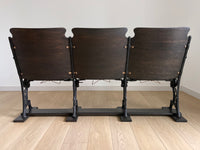 Antique 1920s Theater Seats - Triple Bench Chairs with Arm Rests and Hat Wire Under the Seat - Walnut Base - Cast Iron Brass ** FREE SHIPPING ** This dark and moody historical show-stopper is perfect for a mud room, foyer, entry way, lake or ski home. The cast iron carvings on each end are so stunning with hints of brass shining through. It's decorative all the way through.