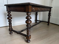 Vintage Portuguese Inspired Wood Barley Twist Writing Desk or Center Table An exceptional monumental Portuguese 1900s inspired barley twist writing desk, console, sofa or center table believed to be from the late 20th century or post 1960s to 1990s. There is not a tag or stamp. Baroque or Jacobean revival style with three smooth sliding drawers. The drawer has a pen holder in the center drawer.