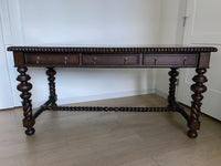 Vintage Portuguese Inspired Wood Barley Twist Writing Desk or Center Table An exceptional monumental Portuguese 1900s inspired barley twist writing desk, console, sofa or center table believed to be from the late 20th century or post 1960s to 1990s. There is not a tag or stamp. Baroque or Jacobean revival style with three smooth sliding drawers. The drawer has a pen holder in the center drawer.