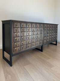 Vintage One-of-a-Kind MCM Remington Lateral 72 Drawer Library Card Catalog. This rare and beautiful dark and moody card catalog, apothecary or architectural cabinet would make a perfect statement piece for your home, office or commercial space!