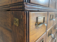 Antique 1900s Yawman Erbe 60 Drawer Library Card Catalog - Quarter Sawn Tiger Oak Industrial Stacking Architectural Cabinet YAWMAN AND ERBE MFG. CO. Rochester, N.Y. U.S.A. file cabinet. c1900s. This rare and beautiful quarter sawn tiger oak card catalog, apothecary, haberdashery or architectural cabinet storage piece would make a perfect statement piece for your bar, wine storage, entryway, foyer, dining room, office or commercial space!