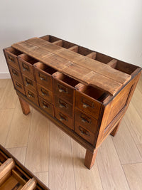 Antique 1900s Yawman Erbe 60 Drawer Library Card Catalog - Quarter Sawn Tiger Oak Industrial Stacking Architectural Cabinet YAWMAN AND ERBE MFG. CO. Rochester, N.Y. U.S.A. file cabinet. c1900s. This rare and beautiful quarter sawn tiger oak card catalog, apothecary, haberdashery or architectural cabinet storage piece would make a perfect statement piece for your bar, wine storage, entryway, foyer, dining room, office or commercial space!