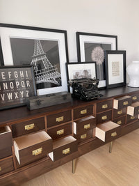 Antique 9 Foot, Mahogany Credenza Lateral 24 Drawer Haberdashery Solid Wood Cabinet - Circa 1920s. A versatile large scale cabinet ideally suited in a retail environment, hotel, library, bourbon bar, an oversized sofa table or office space.