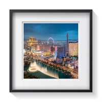 Framed photograph of the skyline of Las Vegas and Bellagio fountains from the Cosmopolitan. Framed fine art cityscape photography by Andrew Grant.  Framed wall art for your home, office, business, restaurant, bar, vacation house or hotel.