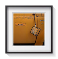 An old vintage patina yellow truck with an advertising for Your Allied Agent. Framed fine art classic truck photography by Andrew Grant. Framed wall art for your home, office, business, restaurant, bar, vacation house or hotel.