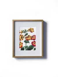 Vintage floral monkey red and yellow spotted flower matted in white and framed in gold. Vertical display wall wart. Perfect addition to any gallery wall. We have several floral prints available. Antique artwork from the 1970s.
