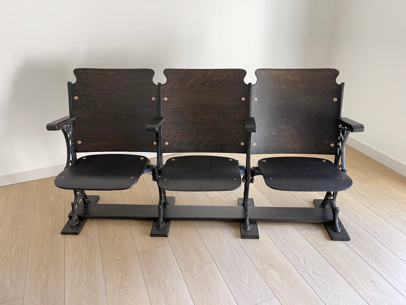 Antique 1920s Theater Seats - Triple Bench Chairs with Arm Rests and Hat Wire Under the Seat - Walnut Base - Cast Iron Brass ** FREE SHIPPING **  This dark and moody historical show-stopper is perfect for a mud room, foyer, entry way, lake or ski home. The cast iron carvings on each end are so stunning with hints of brass shining through. It's decorative all the way through. 