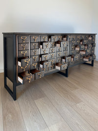 Vintage One-of-a-Kind MCM Remington Lateral 72 Drawer Library Card Catalog. This rare and beautiful dark and moody card catalog, apothecary or architectural cabinet would make a perfect statement piece for your home, office or commercial space!