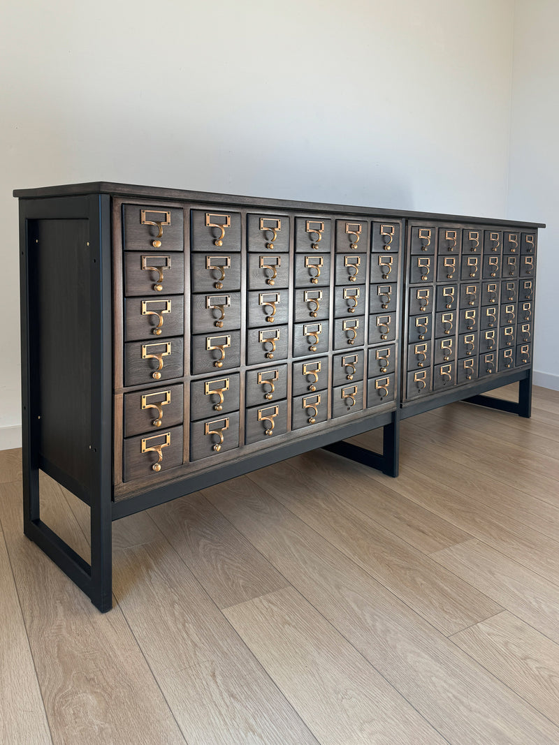 Vintage One-of-a-Kind MCM Remington Lateral 72 Drawer Library Card Catalog. This rare and beautiful dark and moody card catalog, apothecary or architectural cabinet would make a perfect statement piece for your home, office or commercial space!