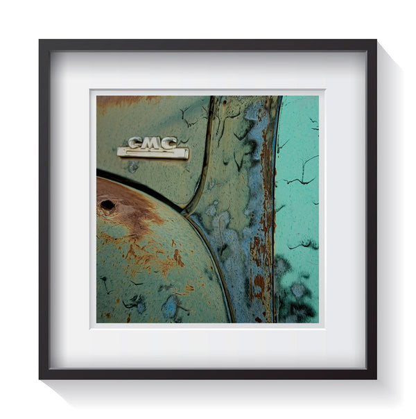 The teal and green patina dripping like paint on an old American Classic GMC pickup truck. Framed fine art classic truck photography by Amanda Hedlund.  Framed wall art for your home, office, business, restaurant, bar, vacation house or hotel.