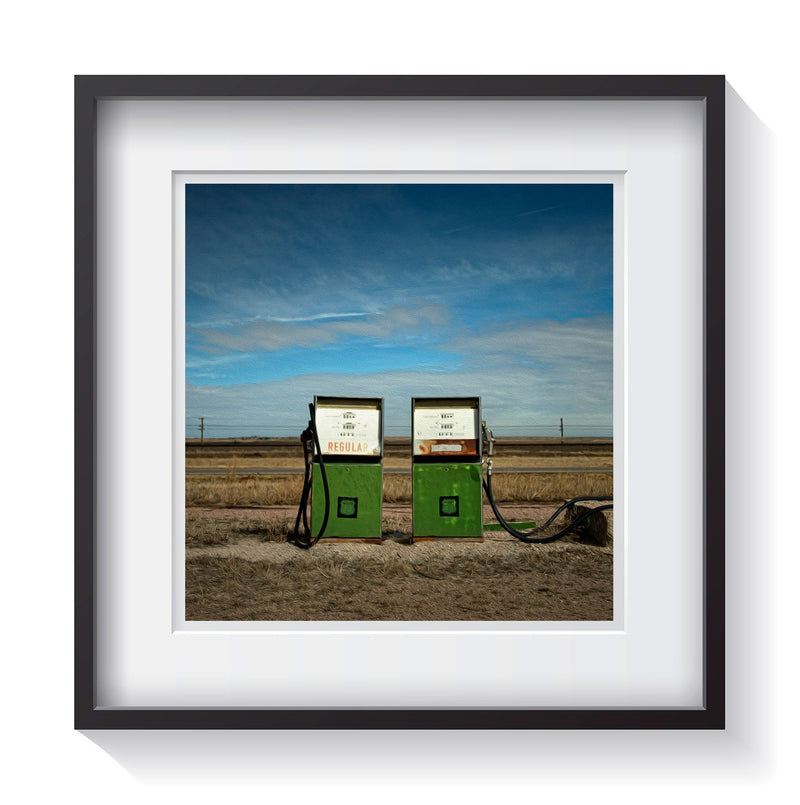 Two green gas pumps decaying in an open field. Fine art americana photography by Amanda Hedlund.  Framed wall art for your home, office, business, restaurant, bar, vacation house or hotel.
