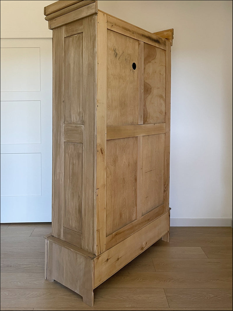 Antique French armoire or wardrobe with one drawer and nice carvings. Meticulously restored, cleaned, sanded & reinforced teak and pine antique wardrobe armoire. 