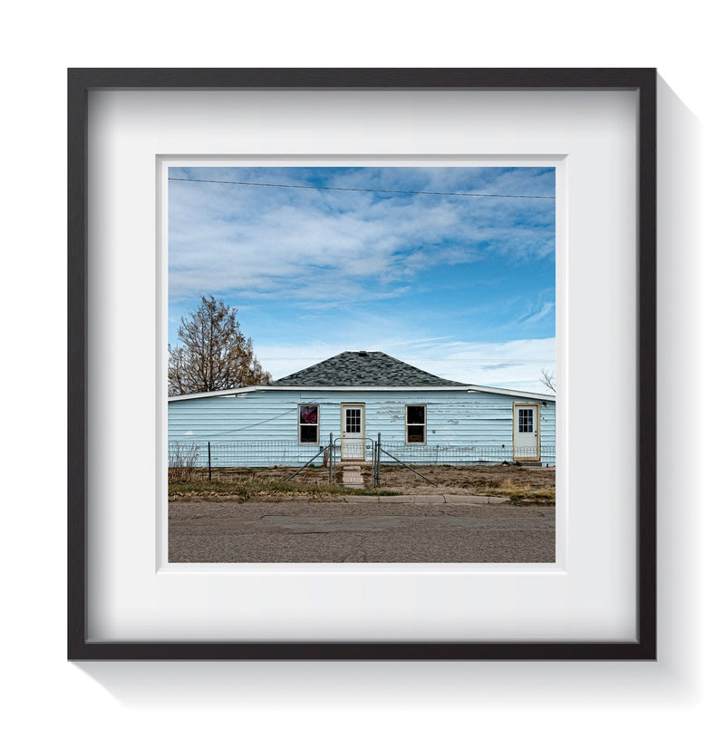The unique architecture of a baby blue rural home. Framed fine art Americana photography by Andrew Grant.  Framed wall art for your home, office, business, restaurant, bar, vacation house or hotel.