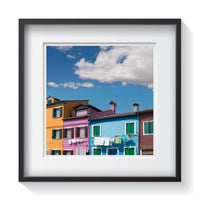 The vibrant colors of the homes and laundry in Burano, Italy. Framed fine art architecture and Europe photography Andrew Grant.  Framed wall art for your home, office, business, restaurant, bar, vacation house or hotel.
