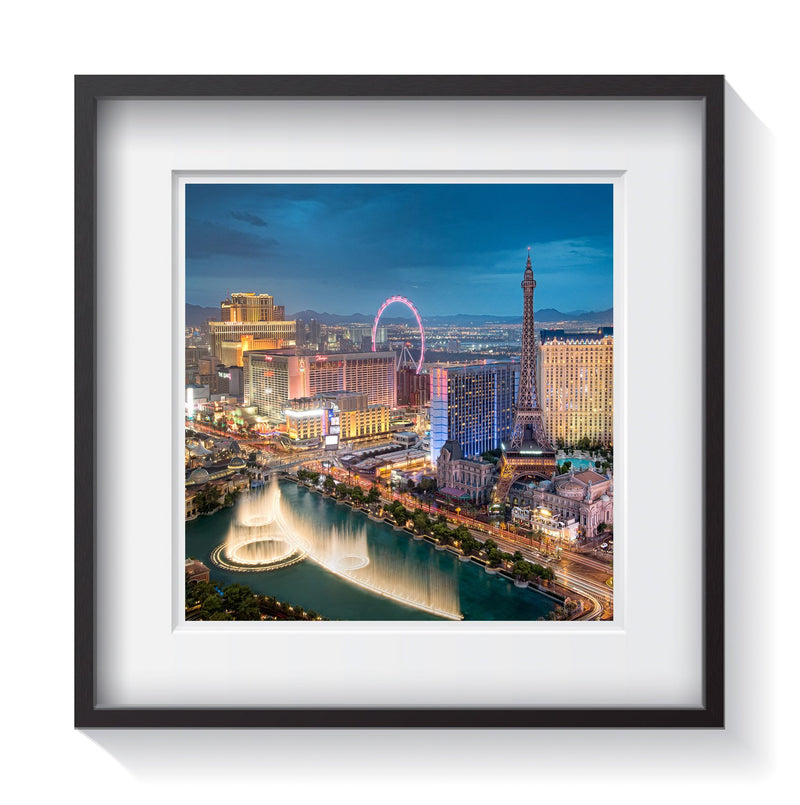 Framed photograph of the skyline of Las Vegas and Bellagio fountains from the Cosmopolitan. Framed fine art cityscape photography by Andrew Grant.  Framed wall art for your home, office, business, restaurant, bar, vacation house or hotel.
