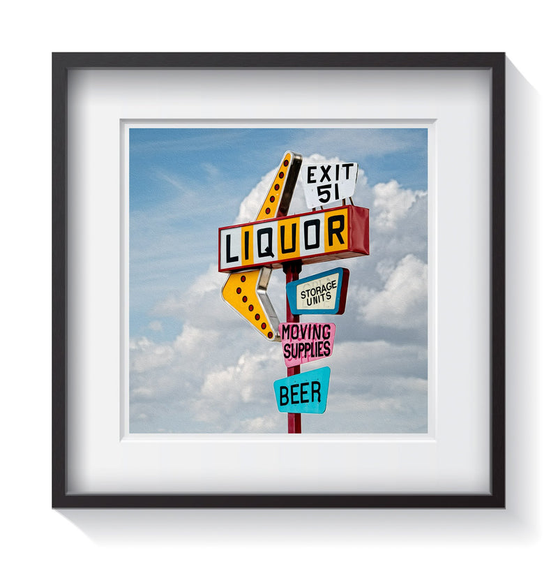 A vibrant vintage roadside sign on Exit 51 for liquor, storage units, moving supplies and beer. Framed fine art vintage sign photography by Amanda Hedlund.  Framed wall art for your home, office, business, restaurant, bar, vacation house or hotel.