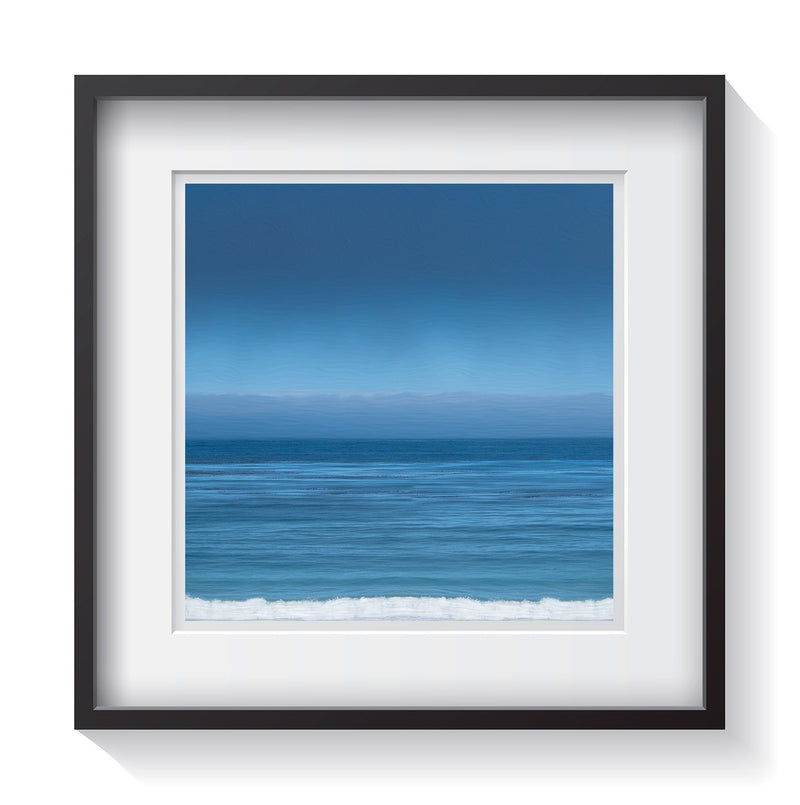 A single wave rumbling from the Pacific Ocean to the shore in Carmel-By-The-Sea, California. Framed fine art waterscape photography by Andrew Grant.   Framed wall art for your home, office, business, restaurant, bar, vacation house or hotel.