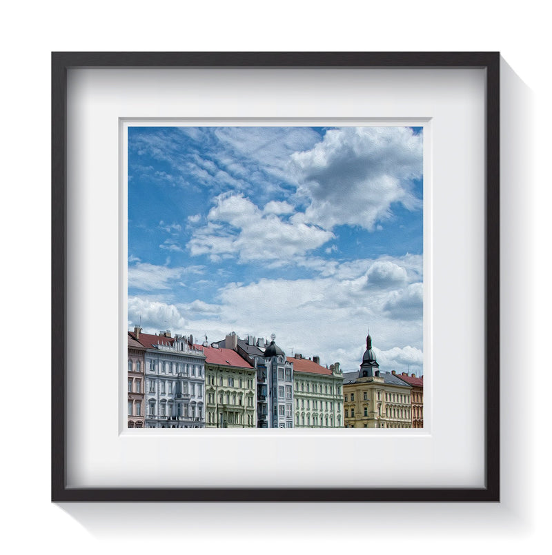 The colorful buildings of Prague along the river Vitava by Amanda Hedlund.  Framed wall art for your home, office, business, restaurant, bar, vacation house or hotel.